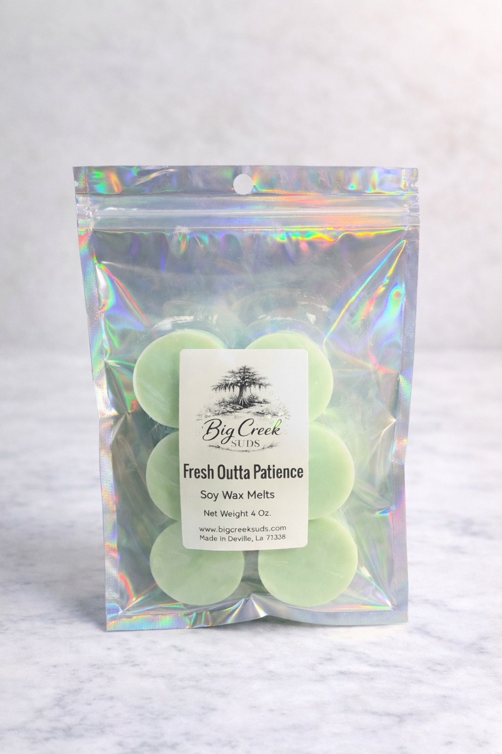 Pack of green soy wax melts with a 'Fresh Outta Patience' label on a white background