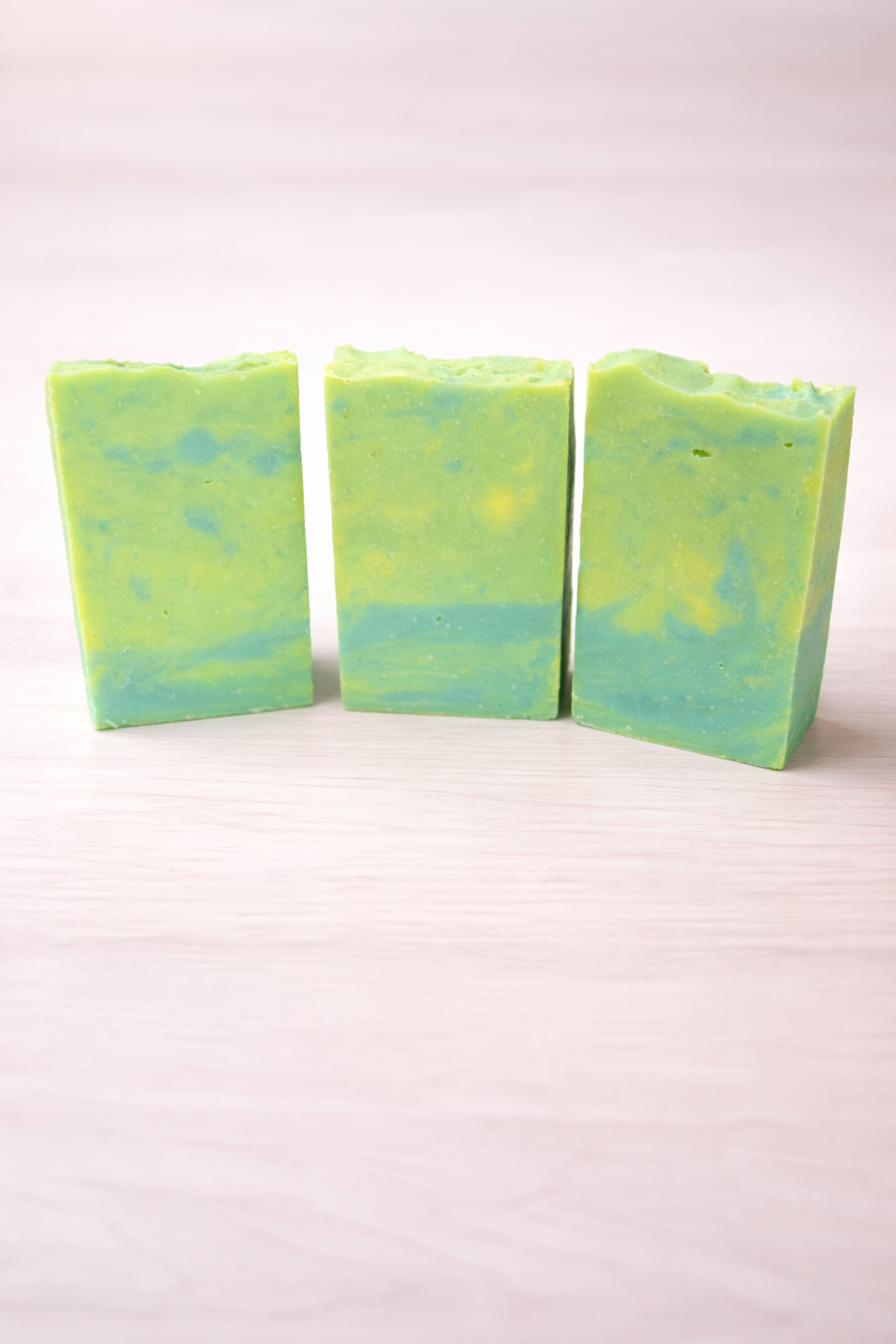Reset button 2  Tallow soap bar On light colored table surface background